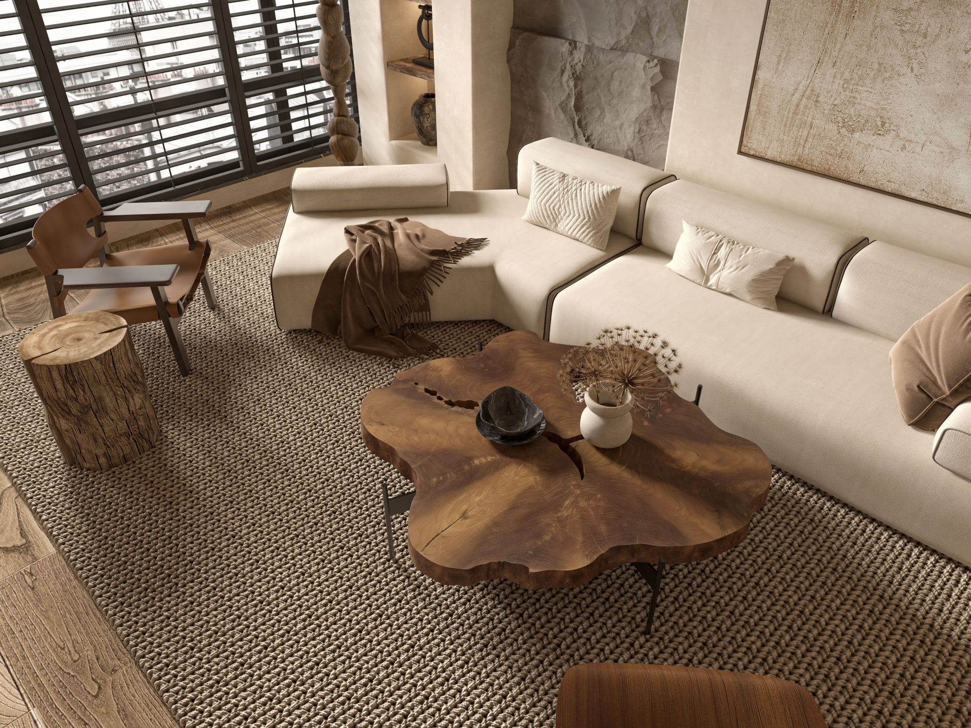 Modern living room featuring a unique wooden coffee table, textured rug, and plush sofa in neutral tones.