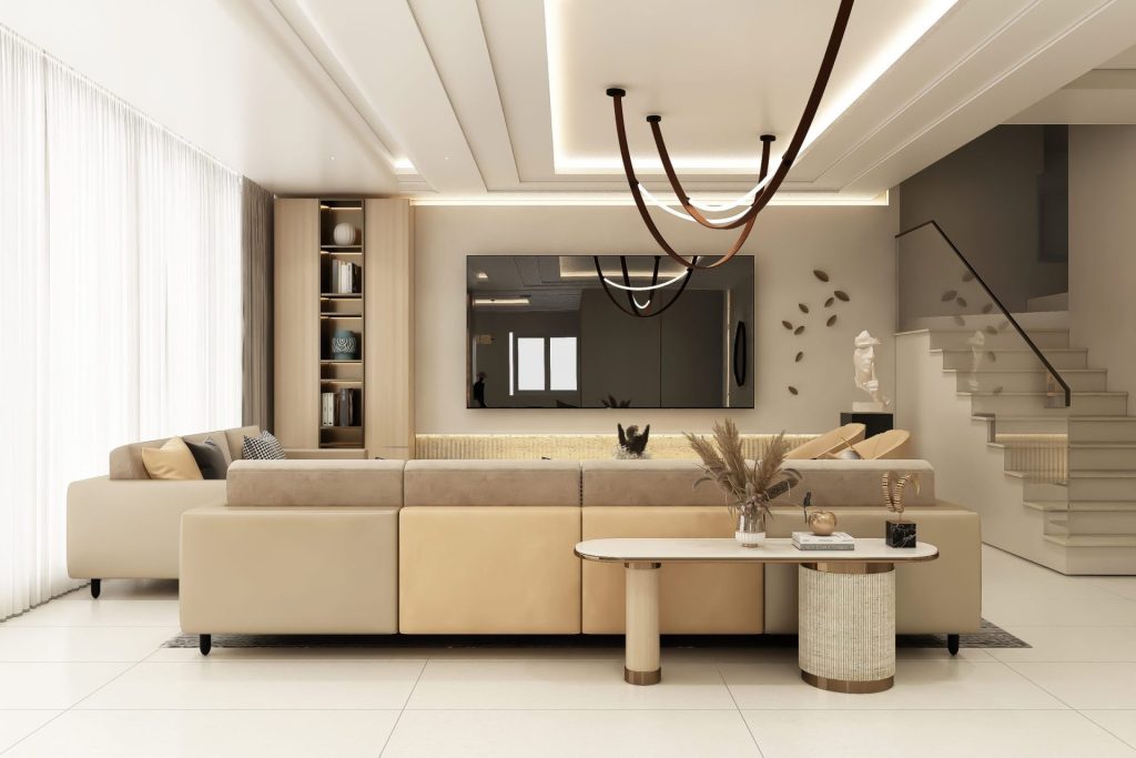 Spacious modern living room featuring beige sofas, chic lighting, and elegant decor.